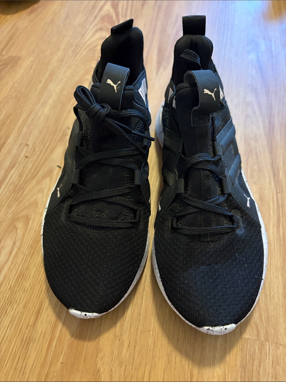 Puma women’s Black Athletic Sneakers with White Accent